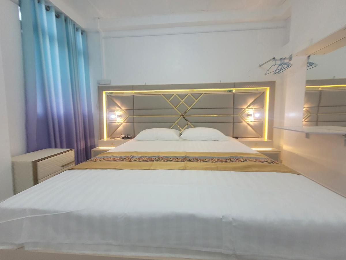 Ontrack Travel Apartment Male Bagian luar foto